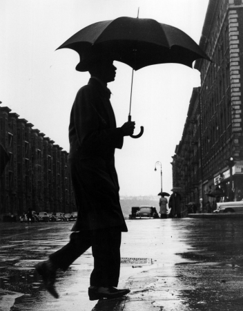 Benn Mitchell, Man with Umbrella in rain, 1947