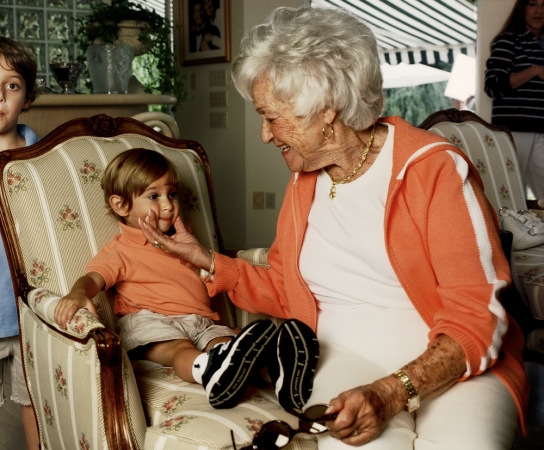 Gillian Laub<br /> <em>Grandma Pinching Nolan's Cheeks, NY, 2005</em><br /> <em>From Family Rename Series, 2007</em><br /> Chromogenic prints<br /> 24 x 20" &nbsp; &nbsp;Edition of 8<br /> 40 x 30" &nbsp; &nbsp;Edition of 5<br /> 50 x 40" &nbsp; &nbsp;Edition of 3