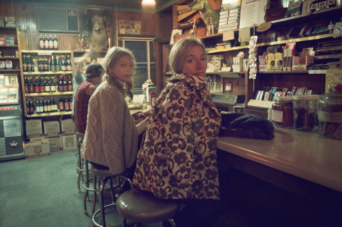Roger Steffens and The Family Acid<br /> <i>Boonville Truck Stop, November,&nbsp;</i>1970<br /> Archival pigment print<br /> 20 x 24" &nbsp; &nbsp; Edition of 8