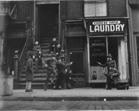 Benn Mitchell,Boys playing in front of Chinese Laundry, 1952