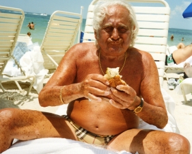 Gillian Laub<br /> <em>Grandpa Eating on the Beach, Naples, FL, 2003</em><br /> <em>From Family Rename Series, 2007</em><br /> Chromogenic prints<br /> 24 x 20" &nbsp; &nbsp;Edition of 8<br /> 40 x 30" &nbsp; &nbsp;Edition of 5<br /> 50 x 40" &nbsp; &nbsp;Edition of 3