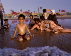 Gillian Laub<br /> <em>Families on Jaffa Beach,&nbsp;Tel Aviv, Isreal, August, 2003</em><br /> Chromogenic prints<br /> 20 x 24" &nbsp; &nbsp;Edition of 8<br /> 30 x 40" &nbsp; &nbsp;Edition of 5<br /> 40 x 50" &nbsp; &nbsp;Edition of 3