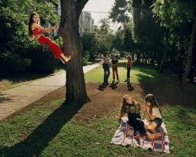 Gillian Laub<br /> <em>Noam in her yard with some neighbors,&nbsp;Tel Aviv, Isreal, May, 2002</em><br /> Chromogenic prints<br /> 20 x 24" &nbsp; &nbsp;Edition of 8<br /> 30 x 40" &nbsp; &nbsp;Edition of 5<br /> 40 x 50" &nbsp; &nbsp;Edition of 3