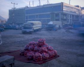 Simon Norfolk<br /> <em>Pakistani Apples For Sale At A Roadside Market, </em>2010<br /> Archival pigment ink prints<br /> 20 x 24" &nbsp; &nbsp;Edition of 7 (plus 2 APs)<br /> 40 x 50" &nbsp; &nbsp;Edition of 7 (plus 2 APs)