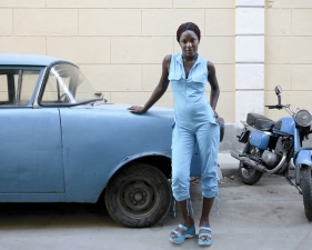 Jeffrey Milstein<br /> <em>Woman in Blue, Havana, Cuba, </em>2004<br /> Archival pigment prints<br /> 16 x 24" &nbsp; &nbsp;Edition of 15<br /> 22 x 33" &nbsp; &nbsp;Edition of 5